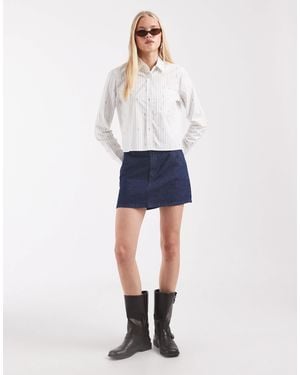 Lacoste Chemise courte en popeline à rayures jacquard coupe regular he - Bleu