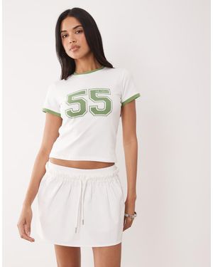The Frolic Exclusive Cotton Rich Contrast Trim Varsity Graphic Front Baby Tee - White