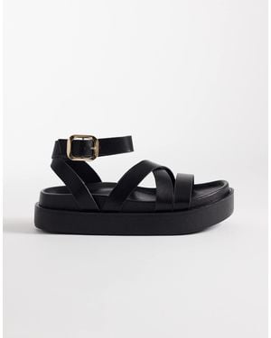 SEQWL – riemchensandalen aus em pu mit flacher plateausohle - Schwarz