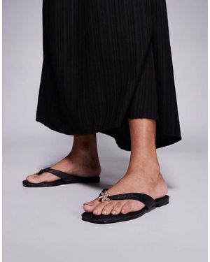 South Beach Flip Flop With Star Embelishment - Black