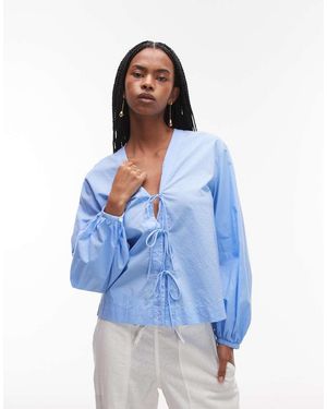 ARKET Blusa Con Scollo A V E Allacciatura Con Fiocchi Sul Davanti