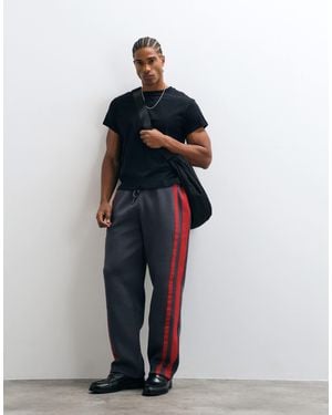 ASOS Straight Leg jogger With Woven Tape - Blue