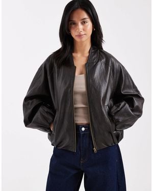 ASOS Asos Design Petite Washed Leather Look Oversized Bomber Jacket - Black