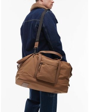 Tommy Hilfiger Sac polochon technique casual - beige - Bleu