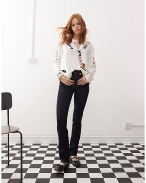 Cheap Monday – sleezie – eng geschnittene superstretch-jeans mit indigo-waschung und hohem bund - Weiß