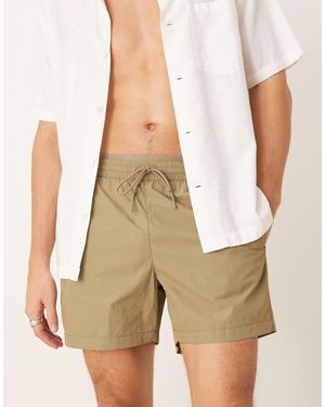 Calvin Klein – ck monogram – badeshorts mit doppeltem bund - Weiß