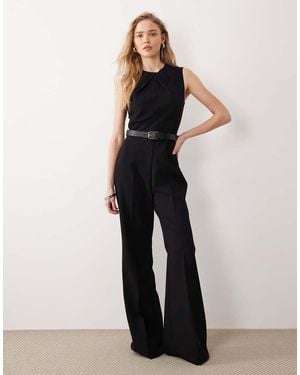 Mango High Neck Sleeveless Jumpsuit With Statement Belt - Black