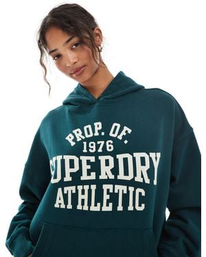 Superdry – athletic essentials – relaxed-fit-kapuzenpullover - Blau