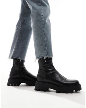 Stradivarius – flache stiefel mit dicker sohle - Blau