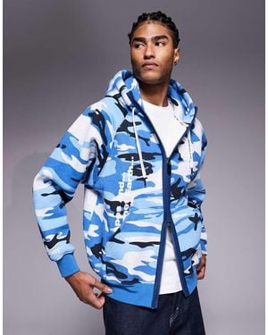 Aape By A Bathing Ape Sudadera Azul Con Estampado De Camuflaje, Capucha Y Cremallera De Tejido Grueso De Aape By A Bathing Ape