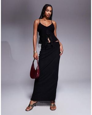 Fashionkilla Jupe droite longue d'ensemble près du corps et sculptée à empiècement en tulle - Bleu