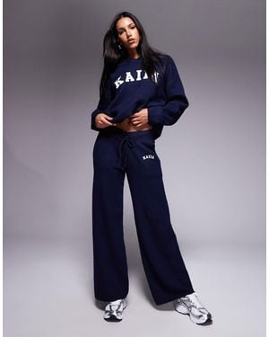 Kaiia Pantalon d'ensemble ample en maille avec broderie logo - Bleu