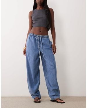 ARKET – weiche schlupfjeans aus denim - Blau