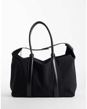 ASOS Reisetasche aus canvas mit trägern - Schwarz