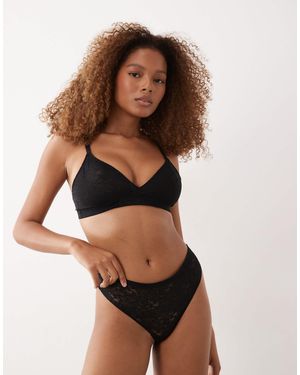 Spanx Day to date night - string invisible ultra-lisse en dentelle - Noir