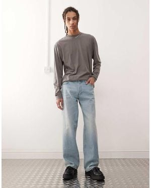 Weekday Vaqueros De Pernera Ancha Y Talle Bajo Con Lavado Azul Claro Sphere De
