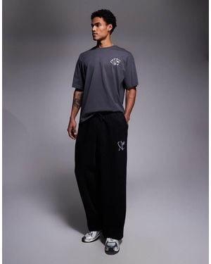 ADPT Loose Fit joggers With Star Logo - Blue