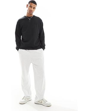 Nike – premium essential – langärmliges t-shirt - Schwarz
