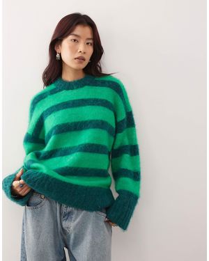 Monki – flauschiger, gestreifter oversize-pullover - Grün