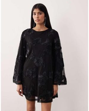 Gina Tricot Long Wide Sleeve Sleeve Flowy Mini Dress With Open Back - Black