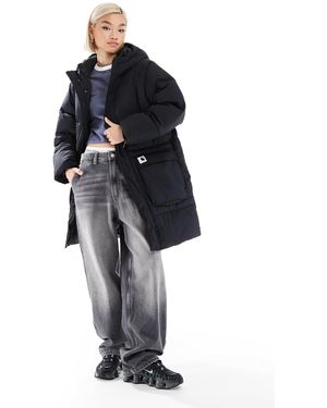 Carhartt – langer, gesteppter parka - Blau