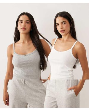 ASOS Pack De 2 Tops De Pijama De De Tirantes De Pointelle Con Detalle De Rosa - Blanco