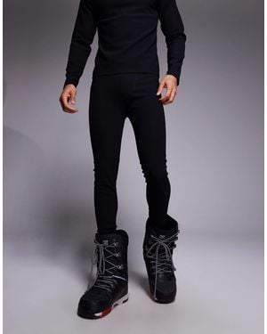 ASOS 4505 Ski & Snow Asos 4505 ski - legging première couche côtelé à envers en polaire et traitement thermique évacuant la transpiration - Noir