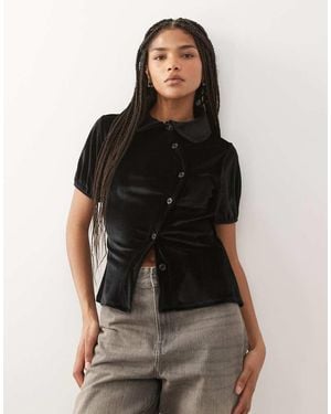 Reclaimed Vintage Neat Fit Velvet Shirt With Asymmetric Buttons And Puff Sleeve - Black