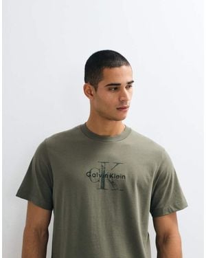 Calvin Klein Monologo Distressed Graphic T-Shirt - Green