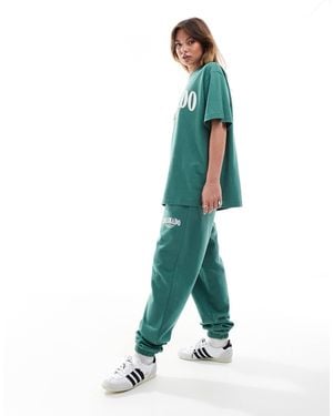 ASOS Cuffed jogger With Colorado Graphic - Green