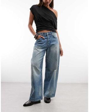 Weekday Low Waist Baggy Wide Leg Jeans With Distressed Details - Blue