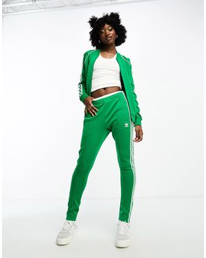 Pantalons de survetement sport adidas Originals pour femme Reductions en ligne jusqu a 48 Lyst Page 4