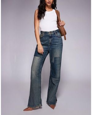 GOOD AMERICAN The Khloé Patchwork Split Hem Jean - Blue