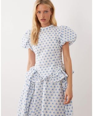 Sister Jane Dream Sea Salt Jacquard Puff Sleeve Ruffle Hem Top - Blue