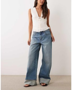 Abercrombie & Fitch Vaqueros De Pernera Ancha Con Bajo Vuelto En - Azul