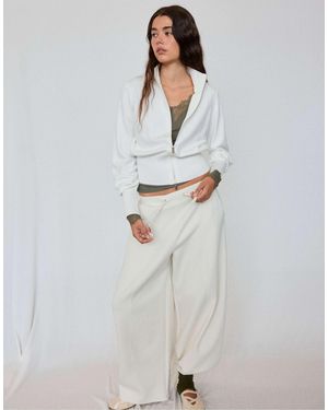 Stradivarius Figurbetonte strickjacke mit reißverschluss - Weiß