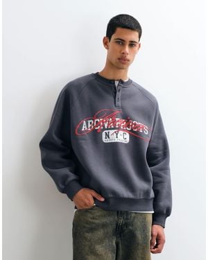 ASOS Regular Henley Sweatshirt With Nyc Script Graphic - Blue