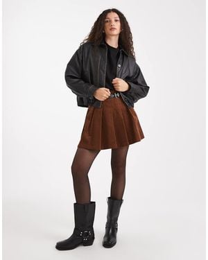 New Look Corduroy Pleated Buckle Mini Skirt - Black