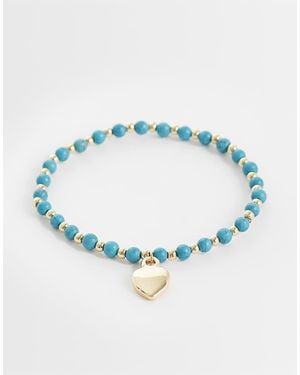 ASOS Bracciale Dorato Con Perline Blu E Ciondolo A Cuore