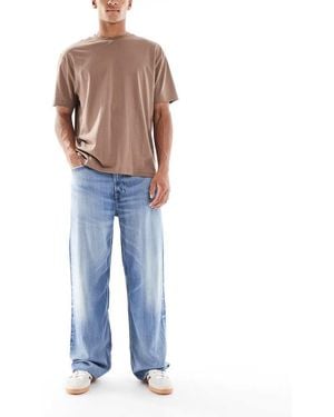Calvin Klein Baggy Jeans Van Tencel Met Wassing - Blauw