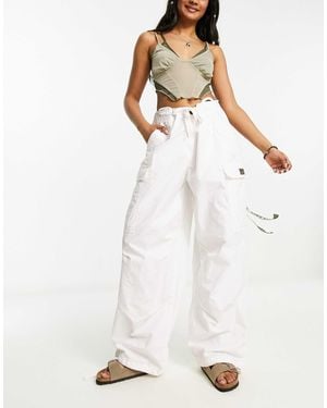 Superdry – weite fallschirmhose - Weiß