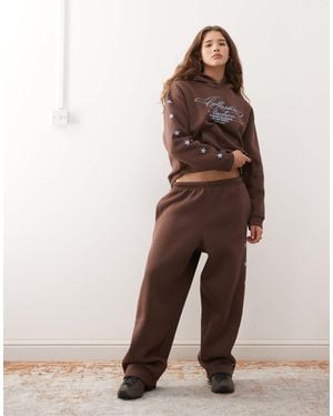 Collusion Star Logo Trackies - Natural