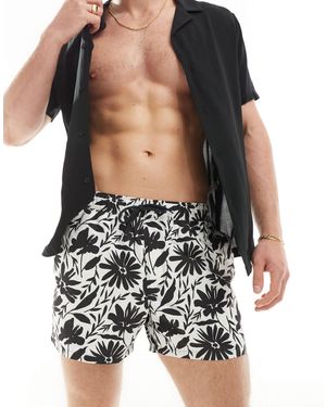 ASOS – kurze badeshorts mit handgemaltem blumenmuster - Schwarz