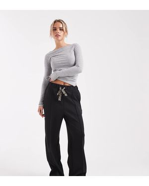 Only Petite Pantalones Negros Con Detalle De Lazo Con Estampado De Leopardo De - Gris