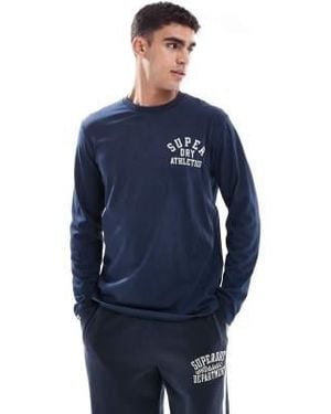 Superdry – athletic essentials – langärmliges oberteil - Blau