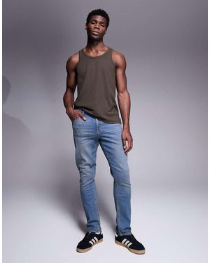 ASOS Jeans Slim Lavaggio Scuro Con Sfumature - Blu