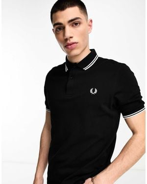 Fred Perry – es polohemd mit logo und zwei zierstreifen - Schwarz