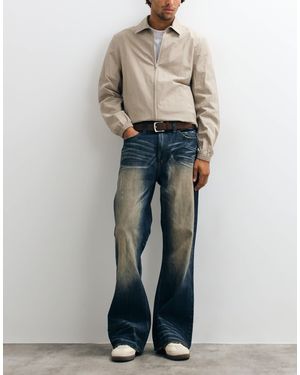 Cheap Monday Jean bootcut coupe ample délavage bleu foncé teinté - Noir