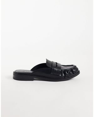 SEQWL Mules mocassins à pampilles cadilliac en en imitation cuir - Noir