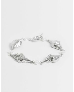 ASOS Bracelet avec barre en t et motif coquillage - Métallisé